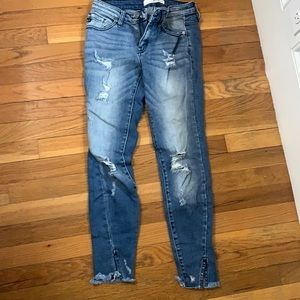 Blue ripped skinny jeans